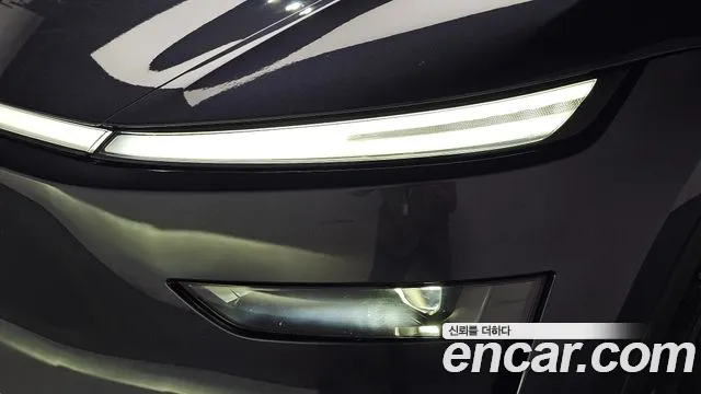 Tesla Model Y — Фото автомобиля 7