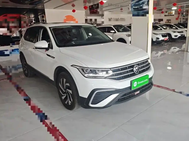 Volkswagen Tiguan L — Фото автомобиля 3