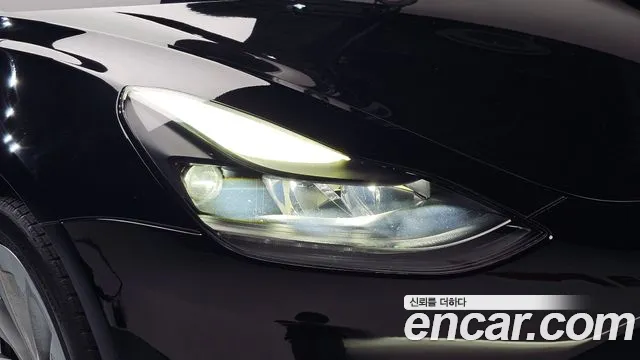Tesla Model 3 — Фото автомобиля 7