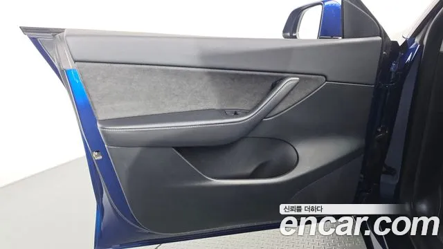 Tesla Model Y — Фото автомобиля 13