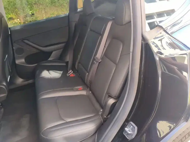 Tesla Model Y — Фото автомобиля 16