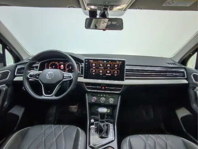 Volkswagen Tiguan L — Фото автомобиля 8