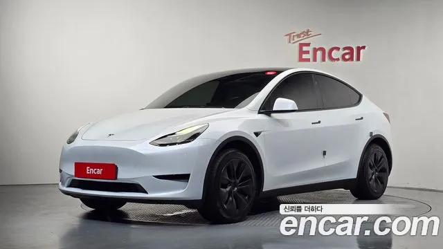 Tesla Model Y — Фото автомобиля 9
