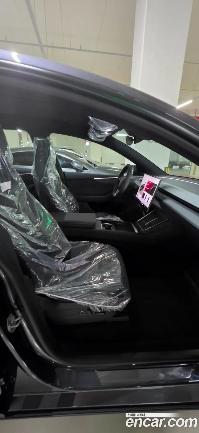 Tesla Model Y — Фото автомобиля 11