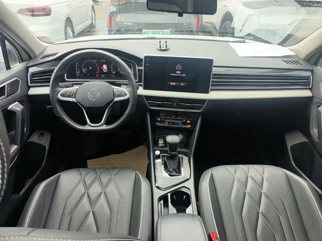 Volkswagen Tiguan L — Фото автомобиля 9