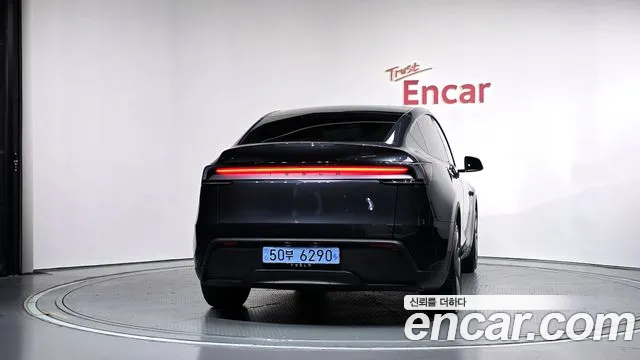 Tesla Model Y — Фото автомобиля 4