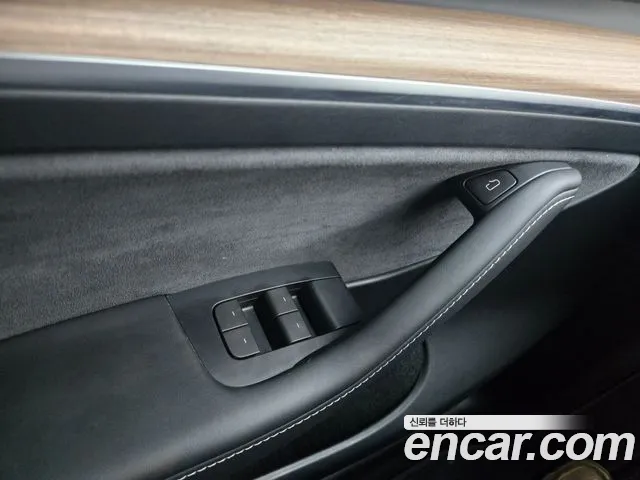 Tesla Model Y — Фото автомобиля 9