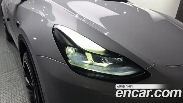 Tesla Model Y — Фото автомобиля 7