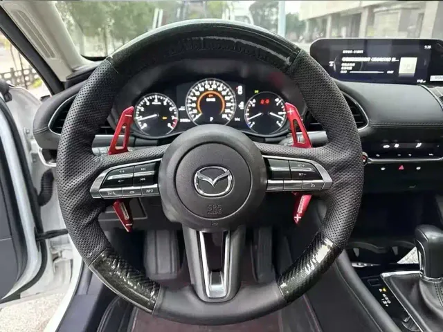 Mazda Axela — Фото автомобиля 7