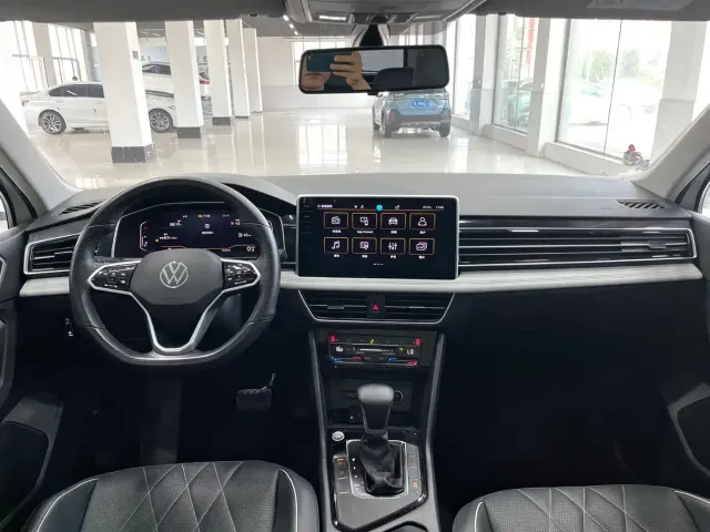 Volkswagen Tiguan L — Фото автомобиля 9