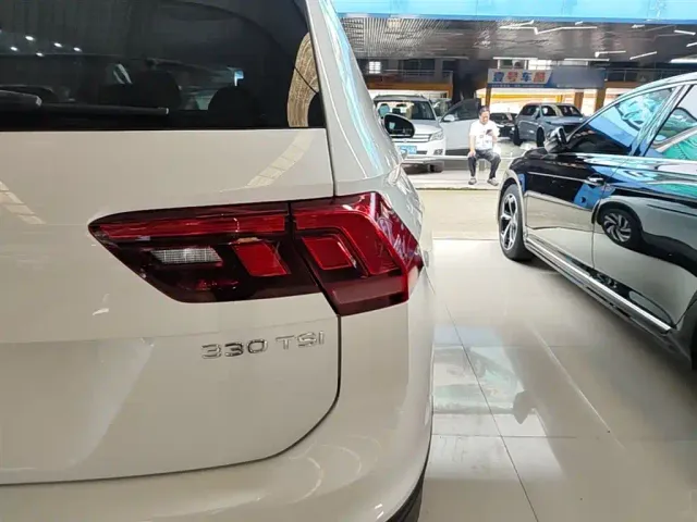 Volkswagen Tiguan L — Фото автомобиля 7