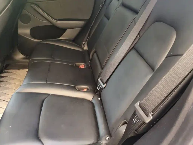Tesla Model Y — Фото автомобиля 13