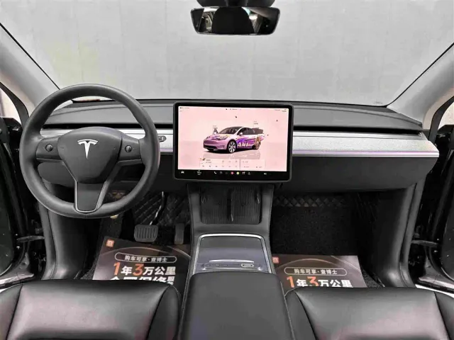 Tesla Model Y — Фото автомобиля 10