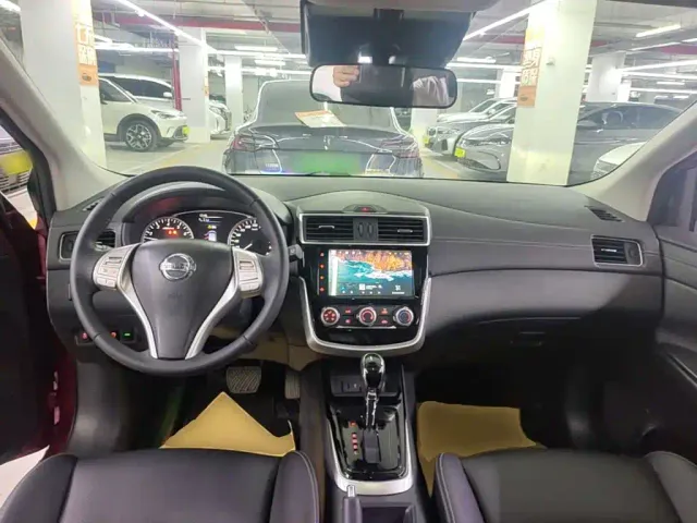 Nissan Tiida — Фото автомобиля 9