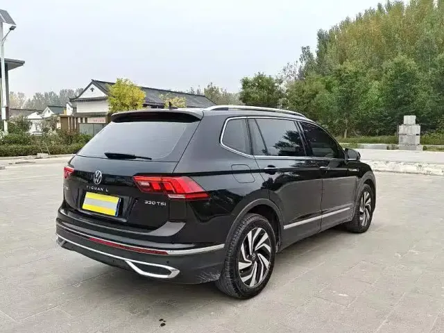 Volkswagen Tiguan L — Фото автомобиля 8
