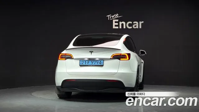 Tesla Model Y — Фото автомобиля 4