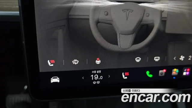 Tesla Model Y — Фото автомобиля 11