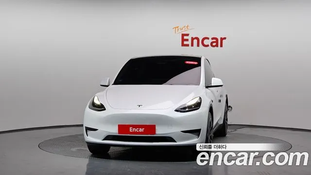 Tesla Model Y — Фото автомобиля 3