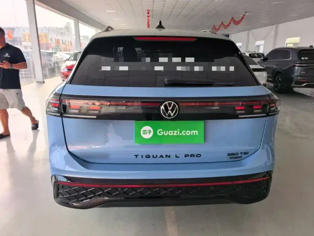 Volkswagen Tiguan L — Фото автомобиля 5