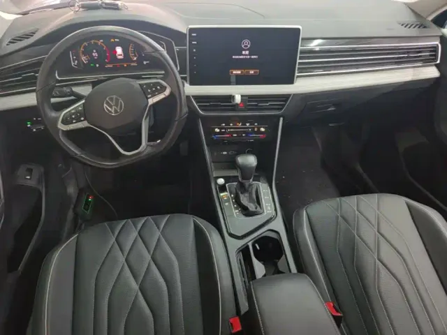 Volkswagen Tiguan L — Фото автомобиля 9