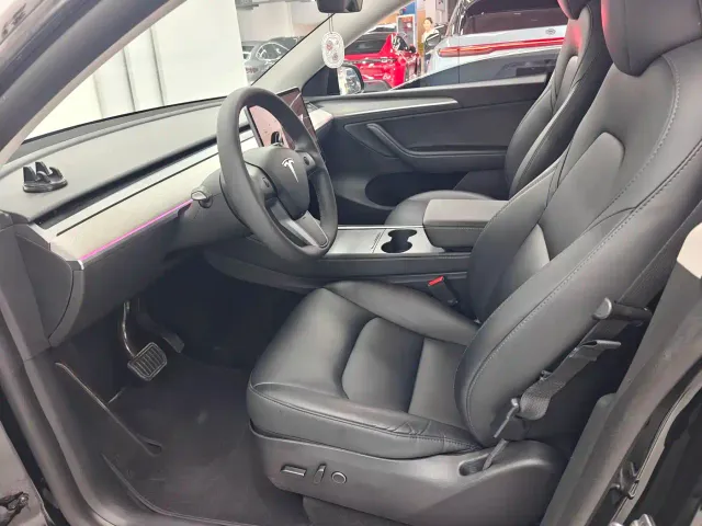 Tesla Model Y — Фото автомобиля 16