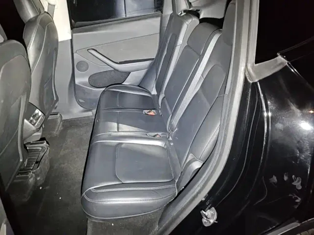 Tesla Model Y — Фото автомобиля 16