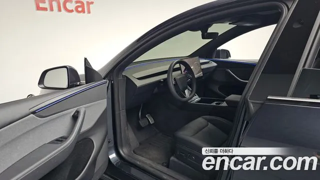 Tesla Model Y — Фото автомобиля 15
