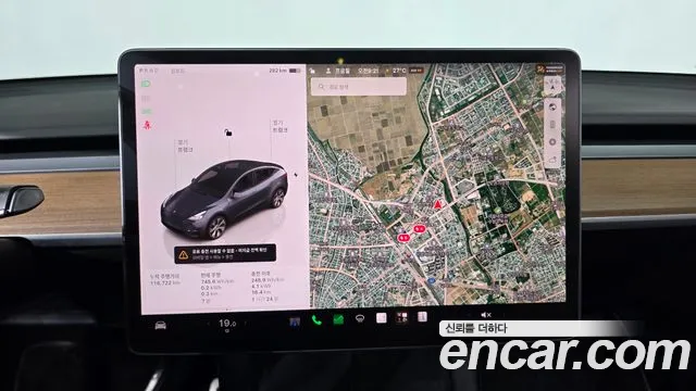 Tesla Model Y — Фото автомобиля 12