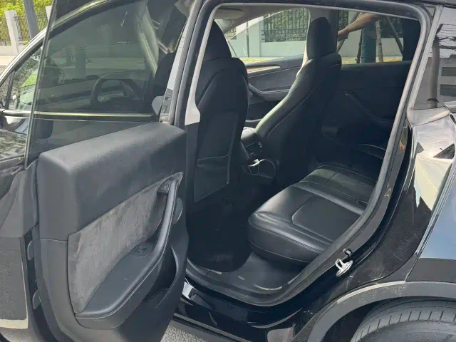 Tesla Model Y — Фото автомобиля 8
