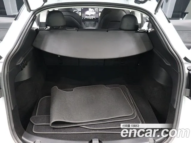 Tesla Model Y — Фото автомобиля 5