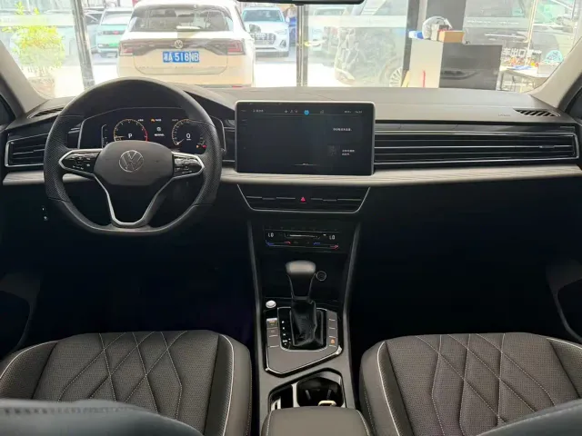 Volkswagen Tiguan L — Фото автомобиля 8