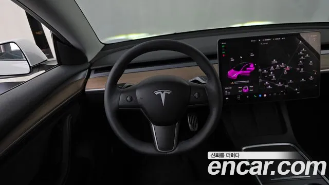 Tesla Model 3 — Фото автомобиля 13