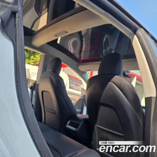 Tesla Model 3 — Фото автомобиля 13