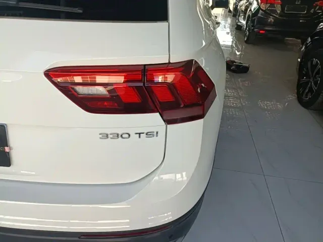 Volkswagen Tiguan L — Фото автомобиля 7