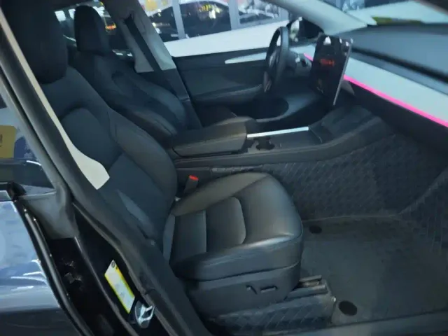 Tesla Model Y — Фото автомобиля 24