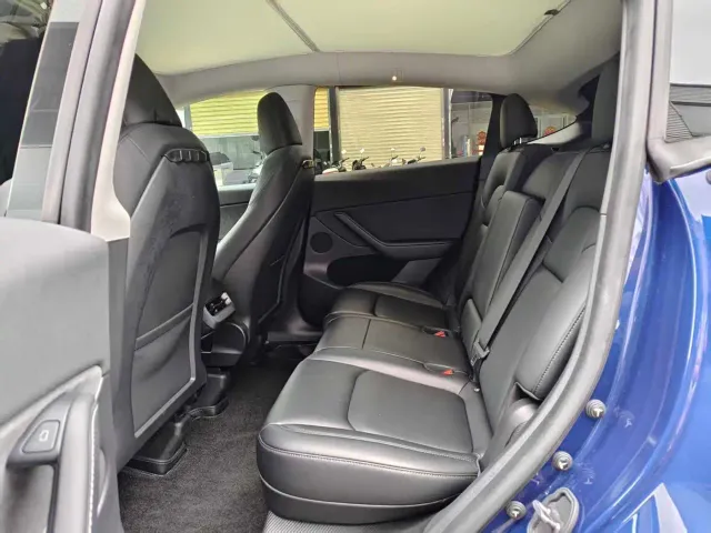Tesla Model Y — Фото автомобиля 6