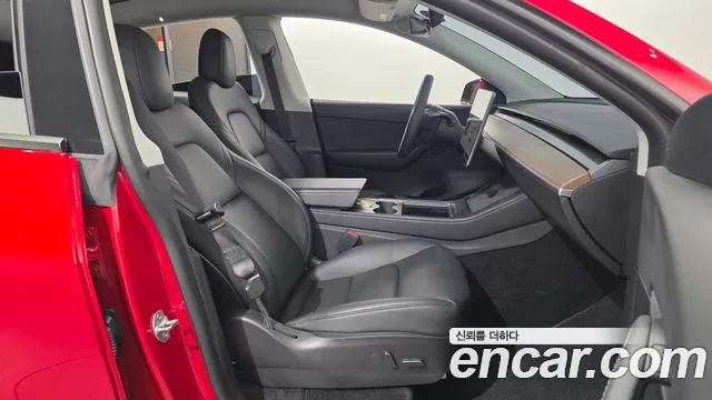 Tesla Model Y — Фото автомобиля 12