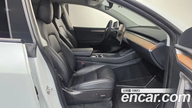 Tesla Model Y — Фото автомобиля 25
