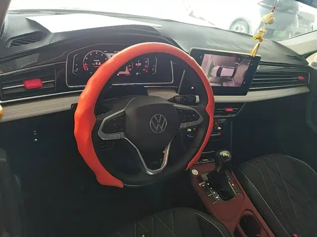 Volkswagen Tiguan L — Фото автомобиля 9