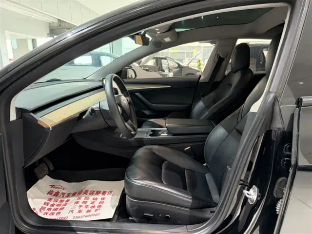 Tesla Model 3 — Фото автомобиля 7