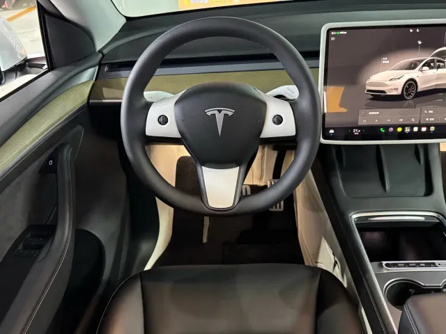 Tesla Model Y — Фото автомобиля 7
