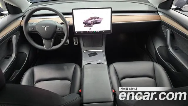 Tesla Model 3 — Фото автомобиля 10