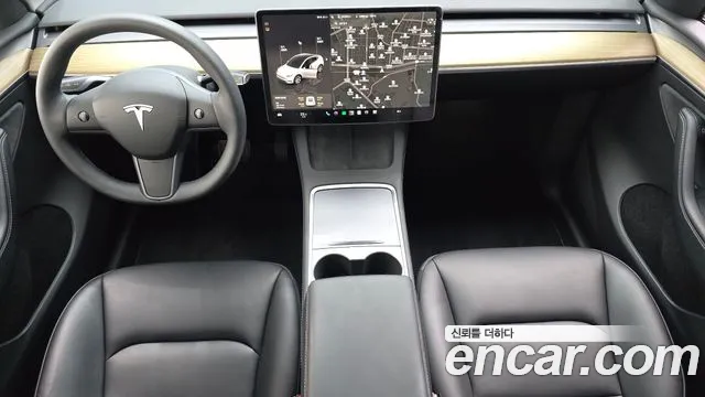 Tesla Model Y — Фото автомобиля 10