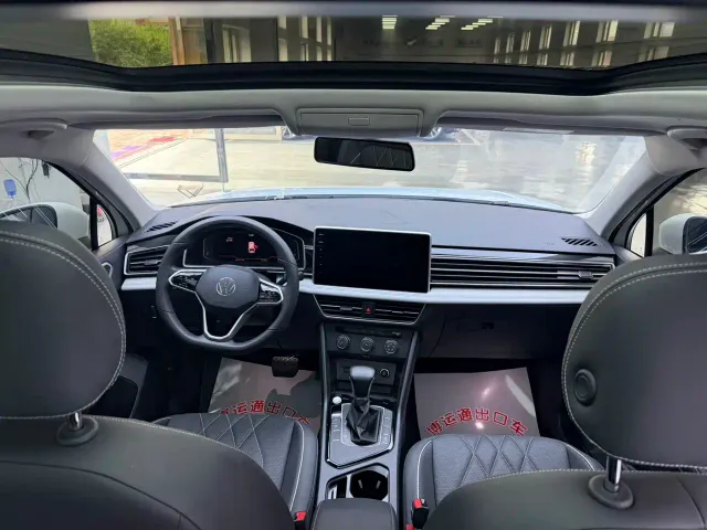 Volkswagen Tiguan L — Фото автомобиля 11