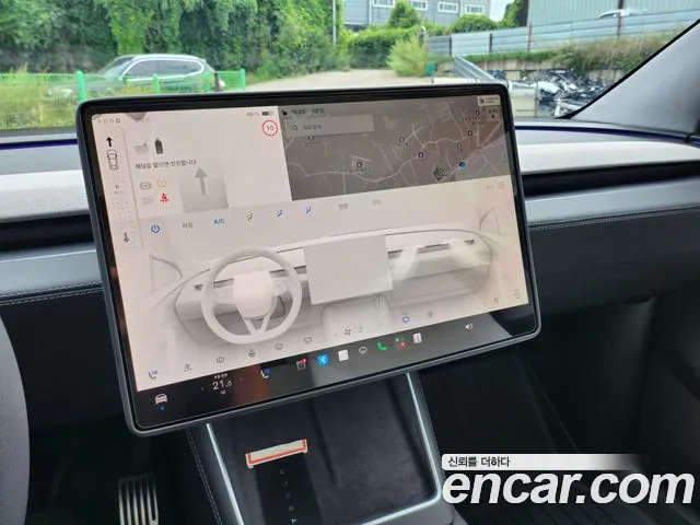 Tesla Model Y — Фото автомобиля 13