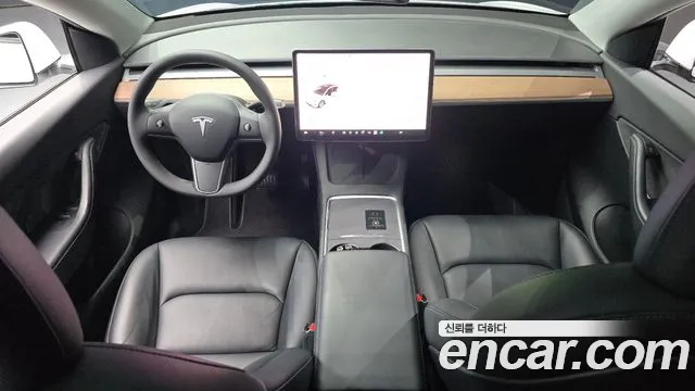 Tesla Model Y — Фото автомобиля 10