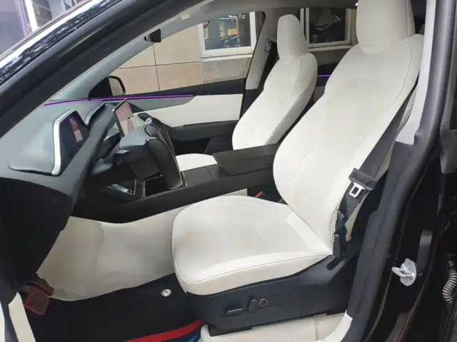 Tesla Model Y — Фото автомобиля 14
