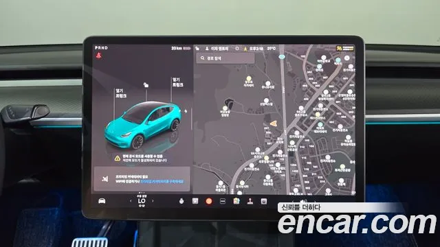Tesla Model Y — Фото автомобиля 13