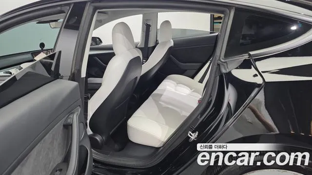 Tesla Model 3 — Фото автомобиля 17
