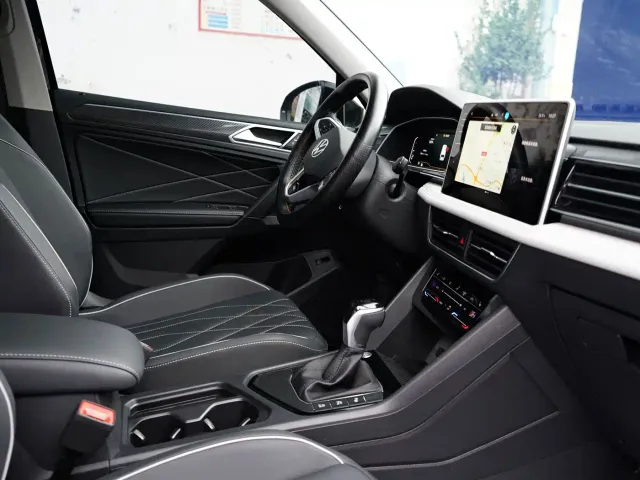 Volkswagen Tiguan L — Фото автомобиля 9